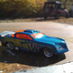 Illustration for article titled Just some bored dude taking pics of crappy diecasts at a boring yard sale...